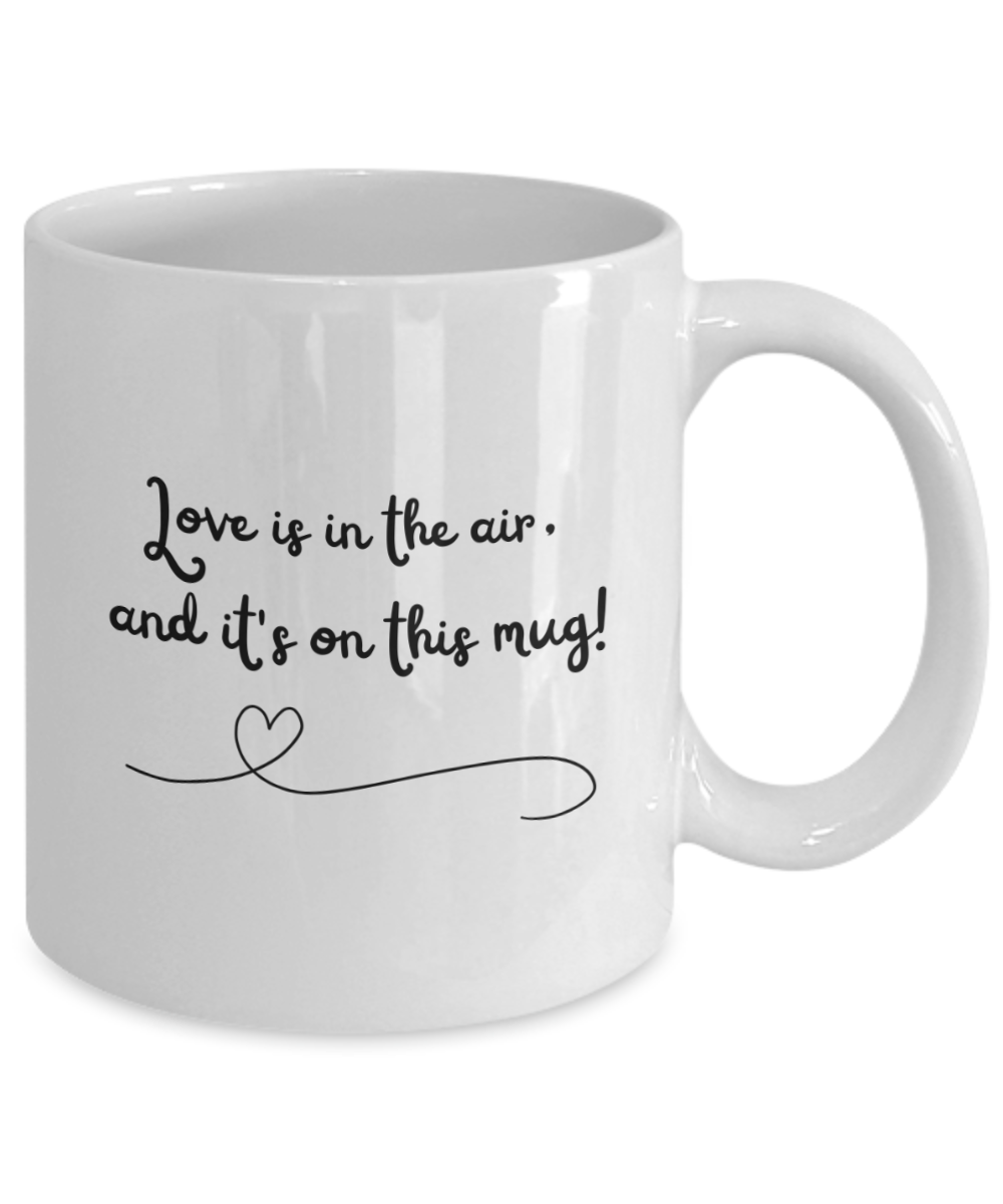 Love is in the air, and it's on this mug! 11oz