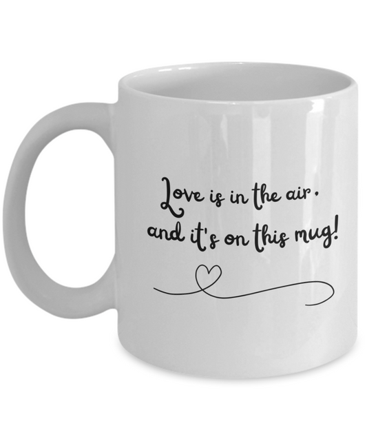 Love is in the air, and it's on this mug! 11oz