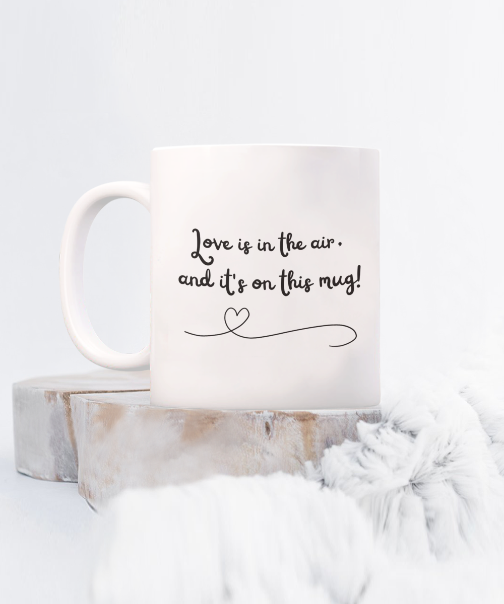 Love is in the air, and it's on this mug! 11oz